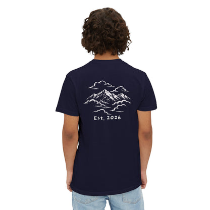 Model wearing the True Navy tee, back view showing the mountains-in-the-clouds print
